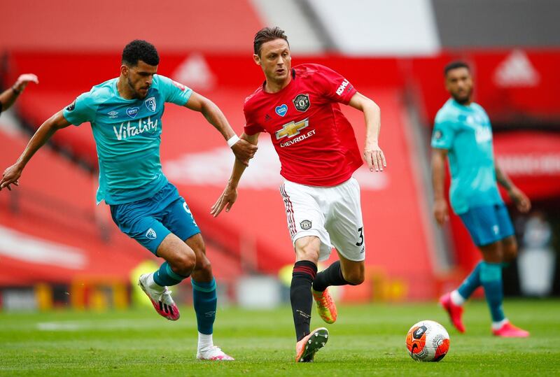 Soccer Football - Premier League - Manchester United v AFC Bournemouth - Old Trafford, Manchester, Britain - July 4, 2020 Bournemouth's Dominic Solanke in action with Manchester United's Nemanja Matic, as play resumes behind closed doors following the outbreak of the coronavirus disease (COVID-19) Clive Brunskill/Pool via REUTERS  EDITORIAL USE ONLY. No use with unauthorized audio, video, data, fixture lists, club/league logos or "live" services. Online in-match use limited to 75 images, no video emulation. No use in betting, games or single club/league/player publications.  Please contact your account representative for further details.