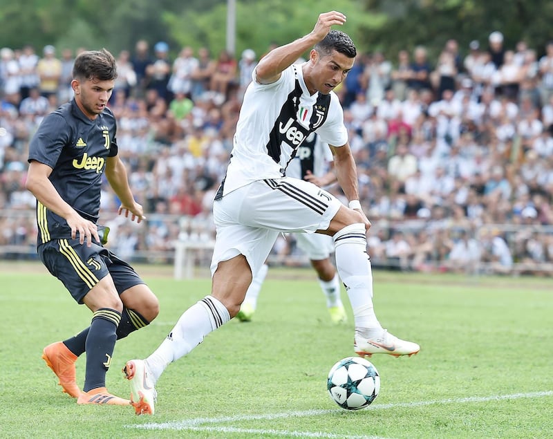 Ronaldo looks to keep the ball under pressure in Sunday's friendly. EPA