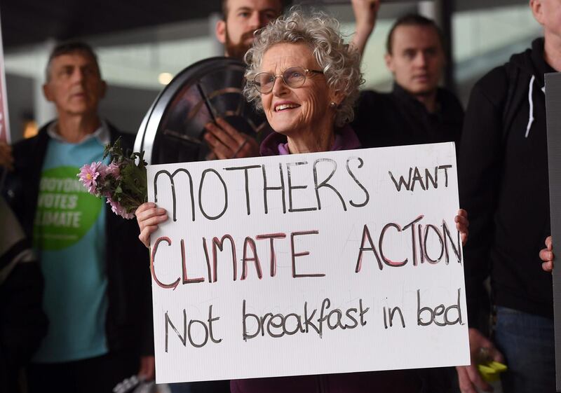 Protesters demonstrate outside the Liberal Party's campaign launch where Australia's Prime Minister Scott Morrison addressed colleagues and supporters in Melbourne. AFP