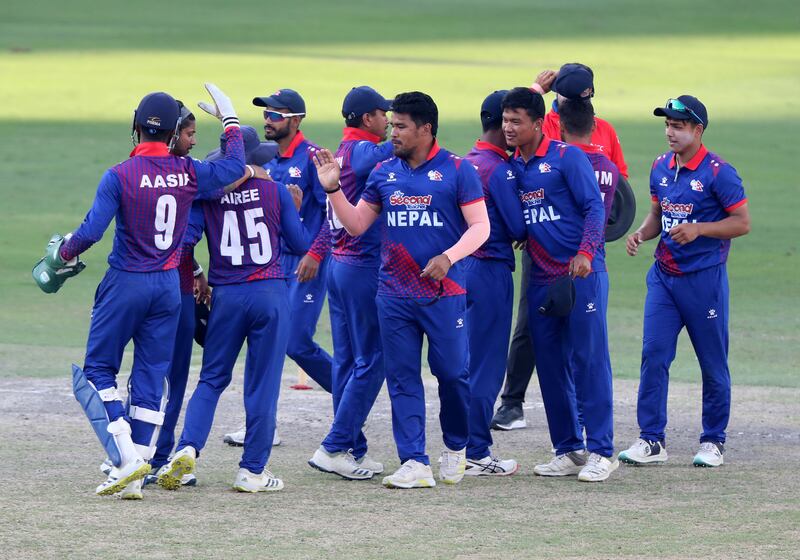 Nepal celebrate their win against the UAE.