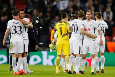 Tottenham players celebrate after winning 3-1during the soccer Champions League group H match between Tottenham and Real Madrid in London, Wednesday, Nov. 1, 2017. (AP Photo/Frank Augstein)