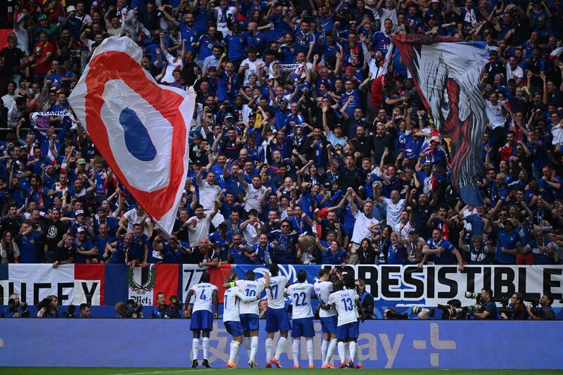 Randal Kolo Muani celebrates scoring his team's winner in front of France's fans. Getty Images