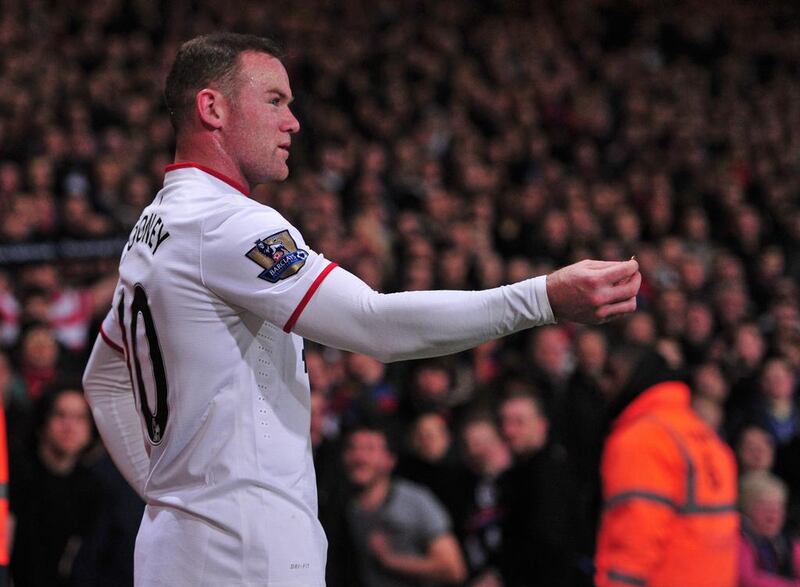 Manchester United striker Wayne Rooney scored his side's second goal in a 2-0 win over Crystal Palace at Selhurst Park on February 22, 2014. Carl Court / AFP