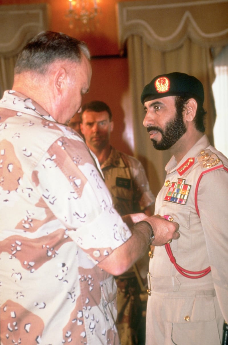 General Norman Schwarzkopf, commander-in-chief, U.S. Central Command, presents the Legion of Merit to Major General Muhammed Said Al-Badi, chief of staff, U.A.E. armed forces, for his role in liberating Kuwait from occupying Iraqi forces during Operation Desert Storm. April 2, 1991. (Photo by Â© CORBIS/Corbis via Getty Images)
