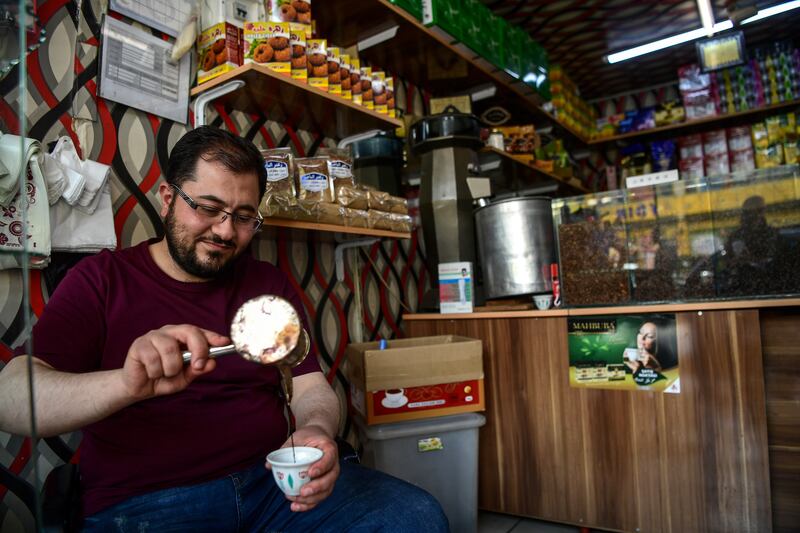The proprietor of Syrian coffee shop in Gaziantep brews up. AFP 