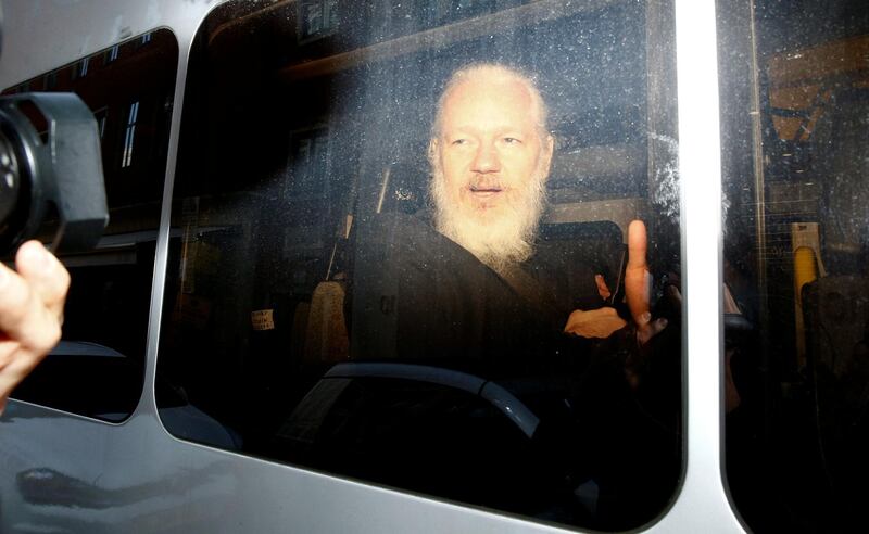 WikiLeaks founder Julian Assange is seen in a police van, after he was arrested by British police, in London, Britain April 11, 2019. REUTERS/Henry Nicholls