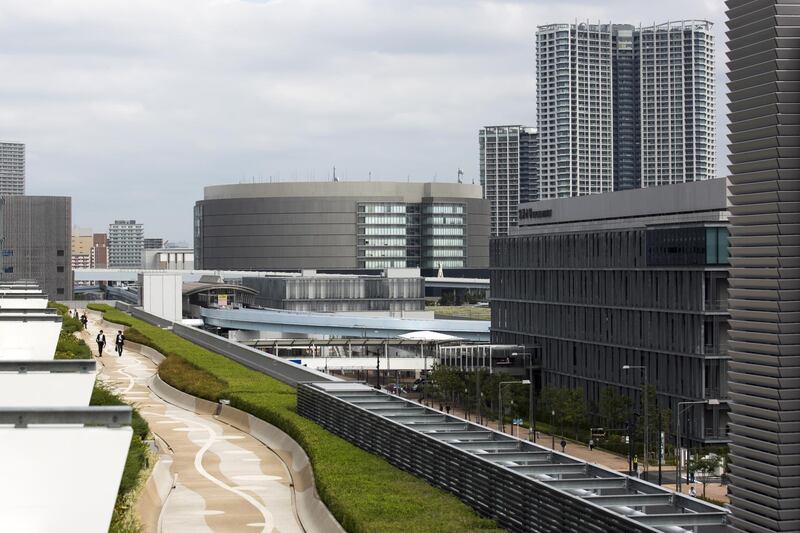 The Toyosu Market, foreground, stands in Tokyo, Japan.