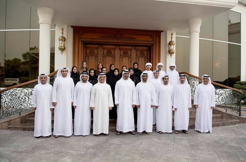 Sheikh Mohammed bin Zayed, Crown Prince of Abu Dhabi and Deputy Supreme Commander of the Armed Forces,  stands for a photograph with Al Bayt Mitwahed members, during a Sea Palace barza. Seen with Mohammed Al Junaibi, Executive Director of Protocol Agenda and Media Sections of the Crown Prince Court of Abu Dhabi (R) and Saif Al Qubaisi, Executive Director of the Citizen Affairs Division at the Crown Prince Court of Abu Dhabi (4th L). Hamad Al Kaabi / Crown Prince Court - Abu Dhabi

( Hamad Al Kaabi / Crown Prince Court - Abu Dhabi )
---