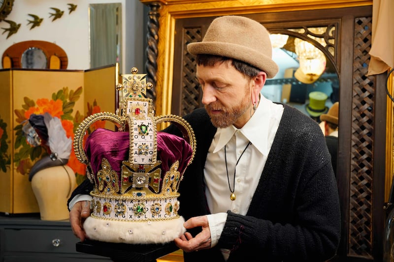 A crown made by British milliner Justin Smith, created using 319 Scrabble tiles to mark the board game's 75th anniversary and the coronation. PA