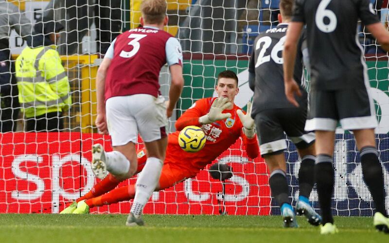 Soccer Football - Premier League - Burnley v Leicester City - Turf Moor, Burnley, Britain - January 19, 2020   Burnley's Nick Pope saves a penalty from Leicester City's Jamie Vardy   Action Images via Reuters/Jason Cairnduff    EDITORIAL USE ONLY. No use with unauthorized audio, video, data, fixture lists, club/league logos or "live" services. Online in-match use limited to 75 images, no video emulation. No use in betting, games or single club/league/player publications.  Please contact your account representative for further details.