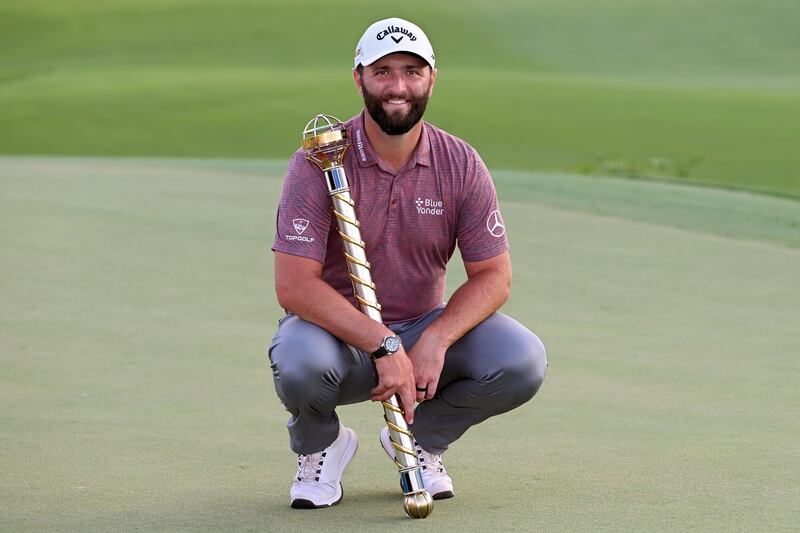 DUBAI, UNITED ARAB EMIRATES - NOVEMBER 20: Jon Rahm of Spain poses with the Race to Dubai trophy during Day Four of the DP World Tour Championship on the Earth Course at Jumeirah Golf Estates on November 20, 2022 in Dubai, United Arab Emirates. (Photo by Ross Kinnaird / Getty Images)