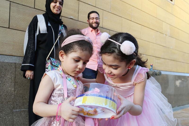 Saudi children with sweets during Eid Al Fitr in Riyadh in 2019. EPA