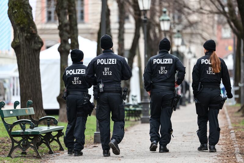 German police officers patrol the area surrounding the conference venue. EPA