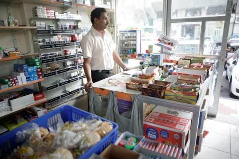 Suvarna Grocery, near Al Wahda Mall, closed on December 31 for failure to modernise under new food-safety rules, but has begun trading again. Sammy Dallal / The National