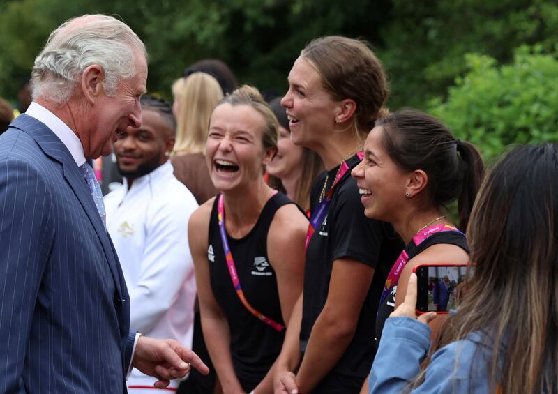 Britain's Prince Charles meets athletes and members of the New Zealand hockey team during a visit to the Athletes' Village at the University of Birmingham at the 2022 Commonwealth Games in England. AP