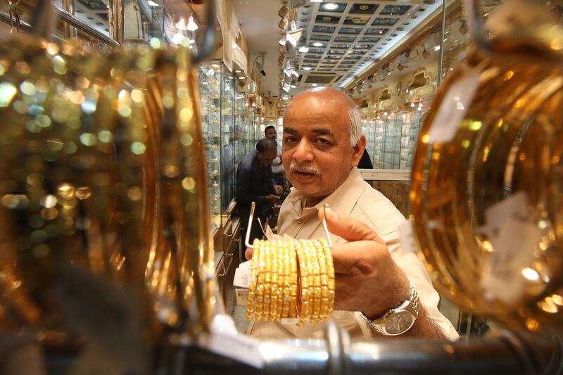 SHARJAH, UNITED ARAB EMIRATES Ð July 27: Dhiru Bhai from Kodinar in Gujarat (India) at his jewelry shop in Central Souk (blue souk) in Sharjah. He came to UAE in 1977 but his father setup the jewelry business in 1961. According to him in old day they were doing business on trust (promise) but now it is running on cash because of fraud. In present time if they want to order some gold then first they have to pay cash. The working hour is from 9am to 1pm and 4pm to 10pm. (Pawan Singh / The National) For News. A Week In Feature
