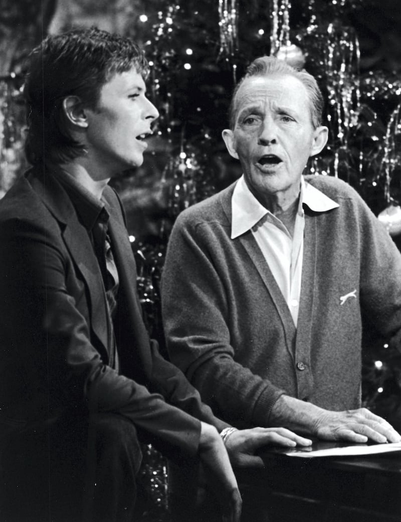 British rock singer and actor David Bowie performs with American pop singer Bing Crosby for the TV special, 'Bing Crosby's Merrie Olde Christmas,' London, England. (Photo by CBS Photo Archive/Courtesy of Getty Images)