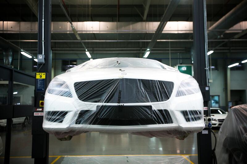 Abu Dhabi, UAE, July 1, 2013:

The Emirates Motor Company warehouse in Mussafah is one of the larger body shops in the country (if not the largest). 

Seen here is a Mercedes geeting some body work done.




Lee Hoagland/The National    (These are for a photo page to run in Business on Aug 2. Please do not use before then unless there is news about the company.)