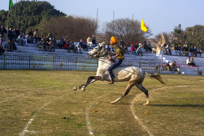 Karanvir Singh Grewal, 15 , from Gujjarwal participates in the horse racing event.