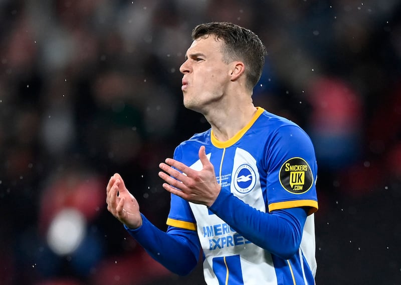 Brighton & Hove Albion's Solly March after missing the penalty in the shootout that handed Manchester United victory. Reuters