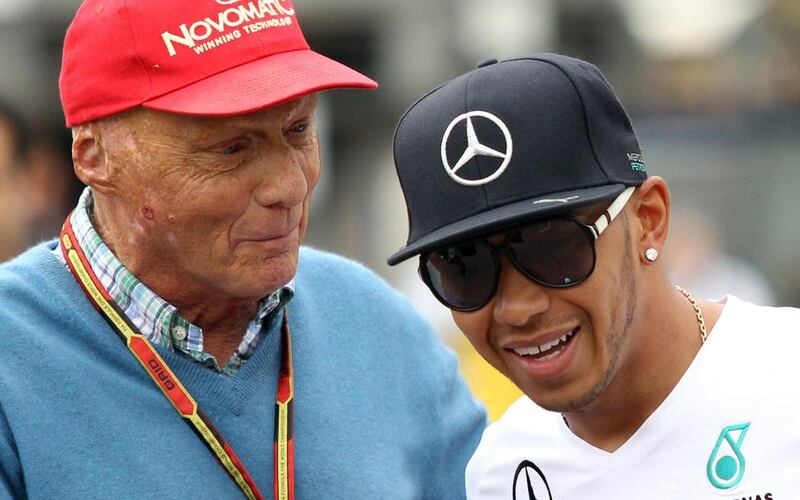 Niki Lauda, left, part of the senior management at Mercedes-GP, plans to hold talks with Lewis Hamilton, right, and Nico Rosberg. Jean Christophe Magnenet / AFP 

