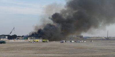 Smoke billows from a fire at a work site in south Reem Island, Abu Dhabi. The National