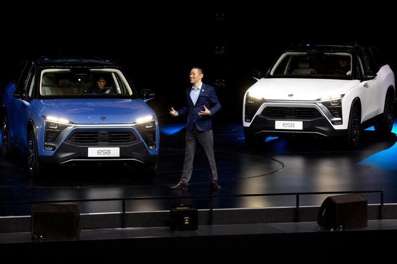 William Li, Founder and Chairman of Chinese automaker NIO launches the NIO ES8 electric SUV during an event held in Beijing, China, Saturday, Dec. 16, 2017.  (AP Photo/Ng Han Guan)