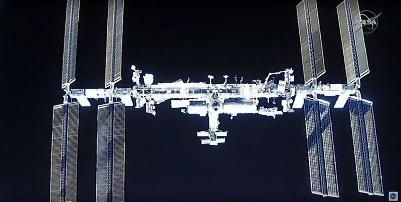 Nasa's SpaceX Crew-1 mission aboard the SpaceX Crew Dragon approaches the International Space Station. Nasa TV / AFP