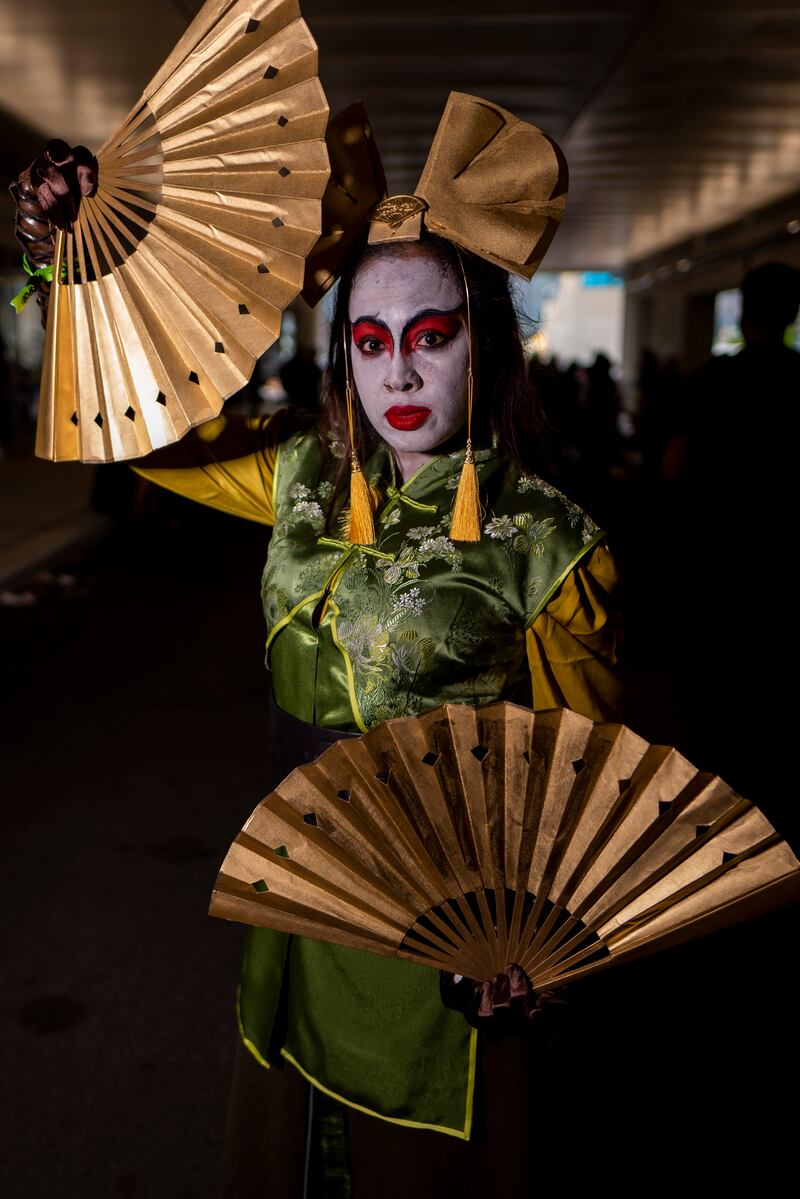 A costumed attendee poses during New York Comic Con. Charles Sykes / Invision / AP