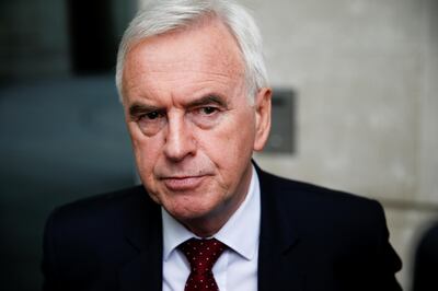FILE PHOTO: British Labour politician John McDonnell speaks to media outside the BBC headquarters after appearing on the Andrew Marr show in London, Britain July 7, 2019. REUTERS/Henry Nicholls/File Photo
