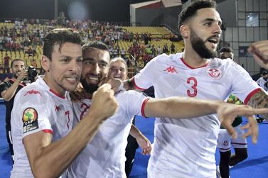 Tunisia midfielder Naim Sliti, centre, celebrates after scoring against Madagascar at the Al Salam Stadium in Cairo. AFP