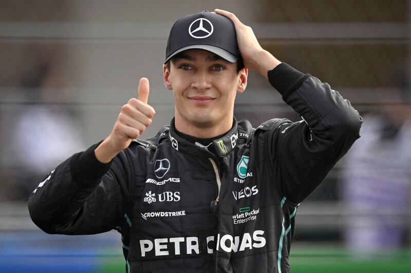 George Russell celebrates after obtaining second place in the Formula One Mexico Grand Prix qualifying session. AFP