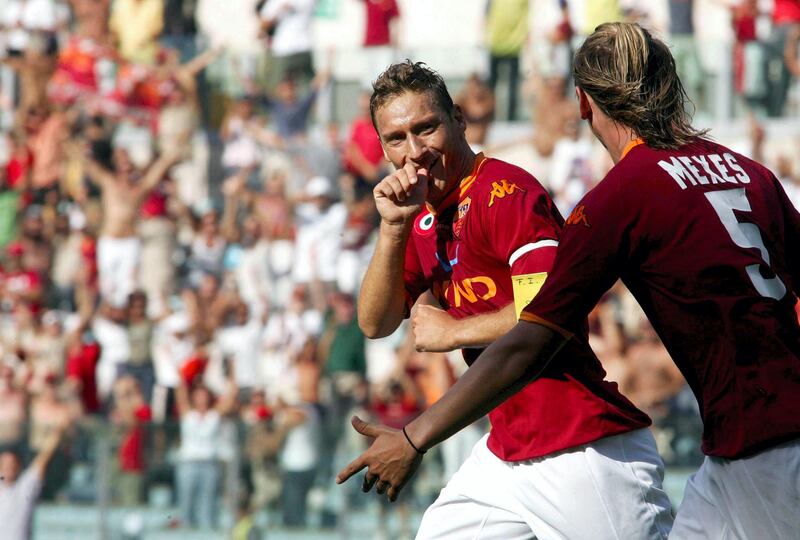 ROME, ITALY - SEPTEMBER 02:  Francesco Totti celebrates scoring the third goal for Roma during a Serie A match between Roma and Siena at the Stadio Olimpico on September 02, 2007 in Rome, Italy. (Photo by NewPress/Getty Images)