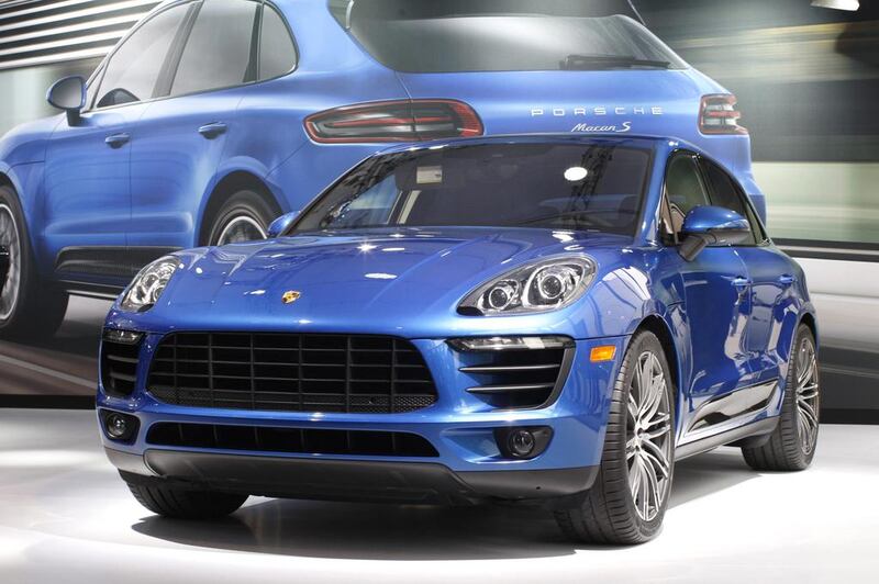 A Porsche Macan S is shown during media preview days at the 2013 Los Angeles Auto Show. David McNew/Getty Images

