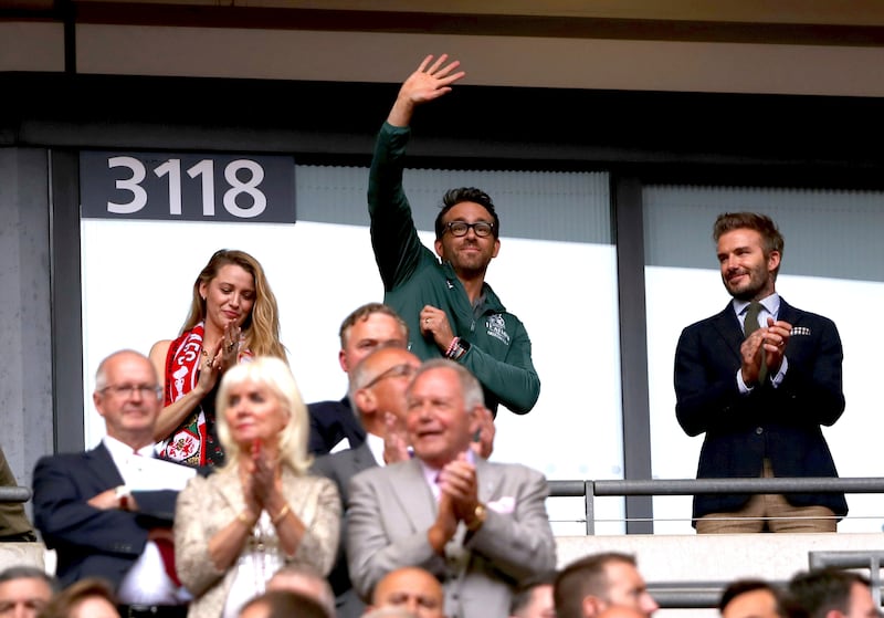 Reynolds with wife Blake Lively and Beckham at a match at Wembley Stadium, London, in May. AP