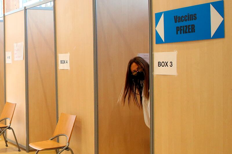 A member of medical staff waits for patients in a vaccination centre in Bayonne, south-west France. AP Photo