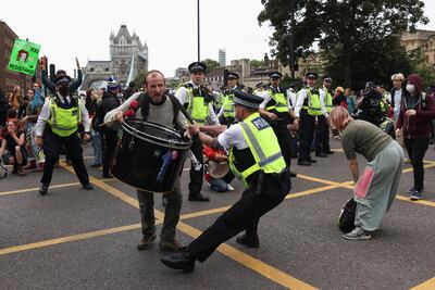Protesters block a road to Tower Bridge during the protet. Reuters