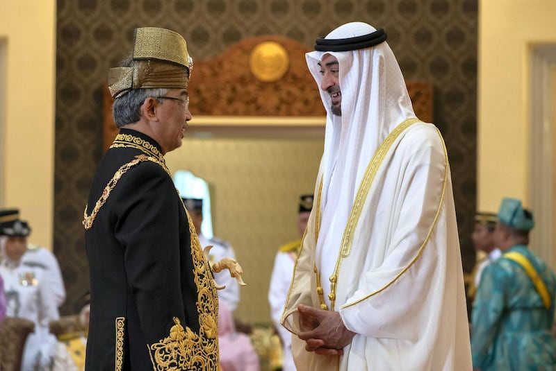 KUALA LUMPUR, MALAYSIA - July 30, 2019: HH Sheikh Mohamed bin Zayed Al Nahyan, Crown Prince of Abu Dhabi and Deputy Supreme Commander of the UAE Armed Forces (R) speaks with HM King Abdullah Ri’ayatuddin Al-Mustafa Billah Shah of Malaysia (L), during the King's inauguration ceremony, at Istana Negara, the National Palace of Malaysia. 

( Mohamed Al Hammadi / Ministry of Presidential Affairs )
---