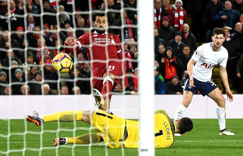 Mohamed Salah scores his side's second goal during the Premier League match between Liverpool and Tottenham Hotspur at Anfield on February 4, 2018. Michael Regan / Getty Images