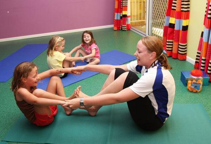 Alison Sykes teaches children relaxation methods as part of the Calm For Kids programme in Brisbane, Australia.