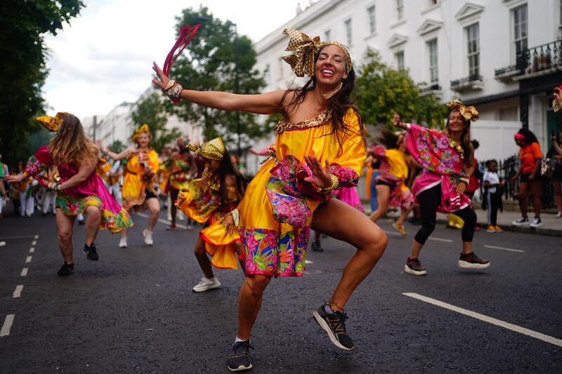 Energetic performers in the children's parade. PA