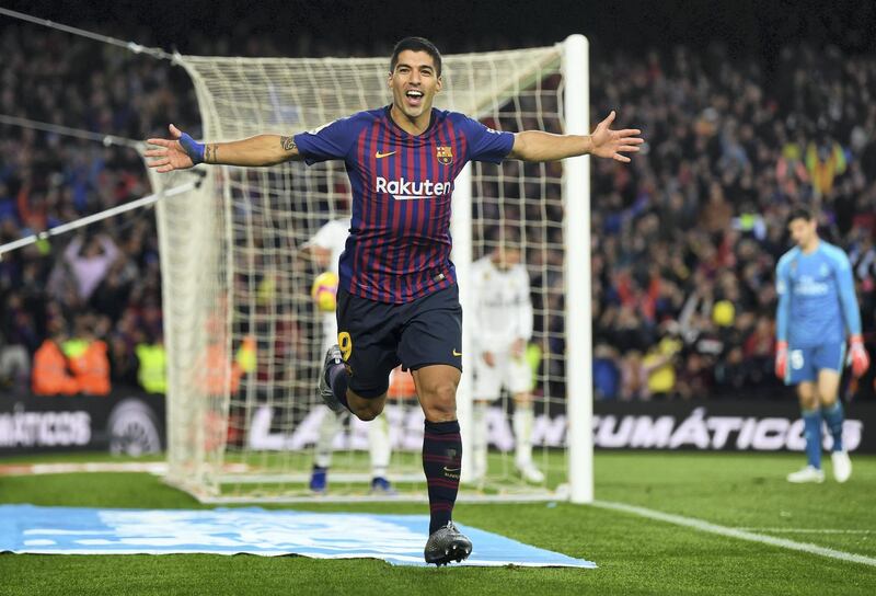 BARCELONA, SPAIN - OCTOBER 28:  Luis Suarez of Barcelona celebrates scoring his sides fourth goal and completes his hat trick during the La Liga match between FC Barcelona and Real Madrid CF at Camp Nou on October 28, 2018 in Barcelona, Spain.  (Photo by David Ramos/Getty Images)