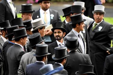 epa07666583 Dubai's ruler Sheikh Mohammed bin Rashid al-Maktoum (C) attends the final day of Royal Ascot in Ascot, Britain, 22 June 2019. Royal Ascot is Britain's most valuable horse race meeting and social event running daily from 18 to 22 June 2019. EPA/FACUNDO ARRIZABALAGA