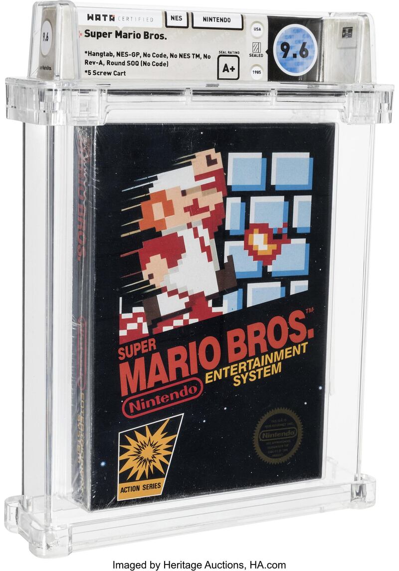 This photo provided by Heritage Auctions, shows an unopened copy of Nintendo's Super Mario Bros., purchased in 1986 and then forgotten about in a desk drawer for decades that has sold for $660,000 at auction. Heritage Auctions in Dallas said theÂ video gameÂ sold Friday, April 2, 2021. (Emily Clements/Heritage Auctions via AP)