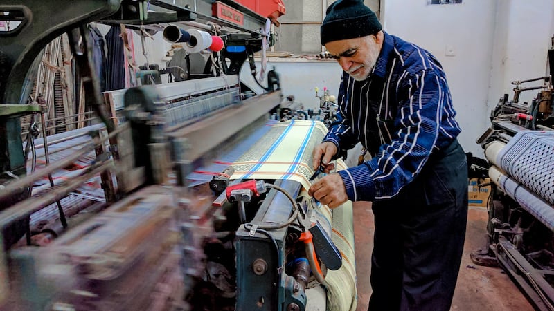 In its heyday, the Hirbawi factory alone weaved 1,000 scarves a day – its machines running for 18 hours a day just to keep up with the demand. Photo: HirbawiUSA