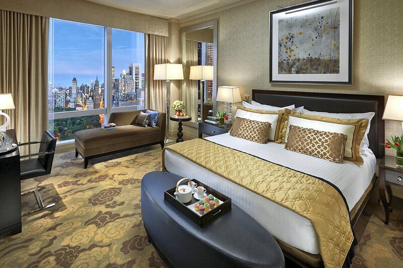 <p>A bedroom with views of Central Park at Mandarin Oriental, New York</p>
