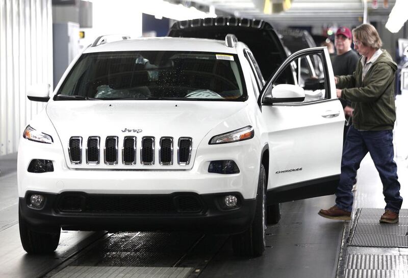 The 2014 Jeep Cherokee undergoes assembly at the Chrysler Toledo North Assembly Plant. Bill Pugliano / Getty Images / AFP