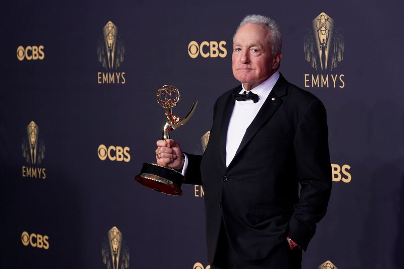 Lorne Michaels, left, poses with the award for Outstanding Variety Sketch Series for 'Saturday Night Live'. AP