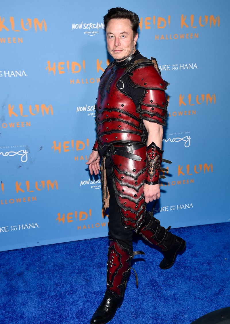 The world's richest man came dressed as a devilish character. Invision / AP