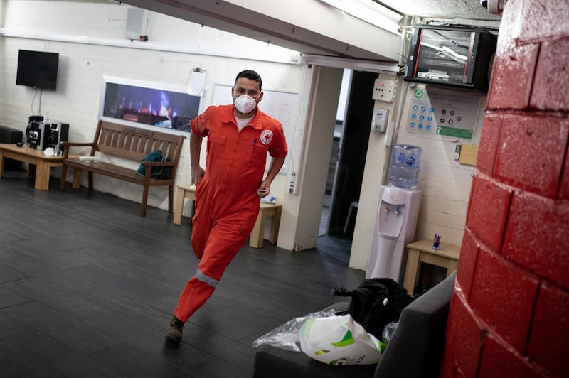 ©2021 Tom Nicholson. 23/01/2021. Jounieh, Lebanon. Lebanese Red Cross volunteer paramedic Patrick ÒRatatouilleÓ Khoueiry reacts in response to a call out during a day shift at the Jounieh station. Patrick got his nickname as when heÕs not volunteering, he is a chef in a hotel in the Achrafieh district of Beirut. Today Lebanon registered 4176 new Coronavirus cases, and 52 deaths. Tom Nicholson for The National